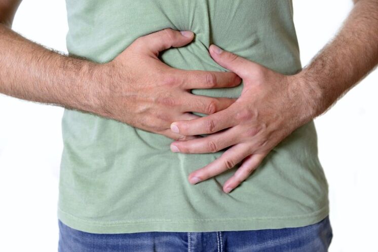 Pain and swelling symptoms of the presence of worms in the intestine